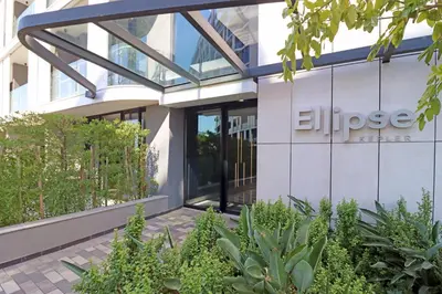 a building with the entrance to an office at Thango Res Ellipse Waterfall. in Midrand