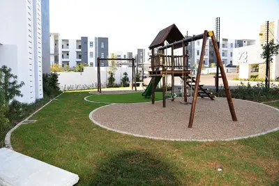 a playground in a park in a city at Elcaro Luxury Villas-Royal Abode in Midrand