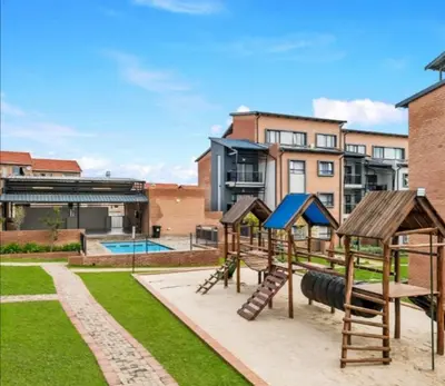 a playground with a slide at The Ridge View in Midrand