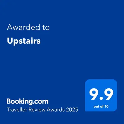a blue text box with the words awarded to ustris at Upstairs R-1 Self-Catering Unit in White River