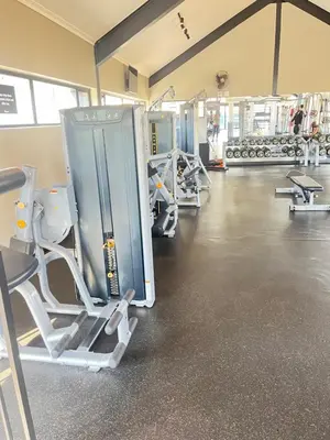 a gym with several rows of treadms and machines at Secure 1 Bedroom Apartment in Midrand, Waterfall City - Lock Up and Go - Free WIFI and Parking - 4A Elizabeth Place in Midrand