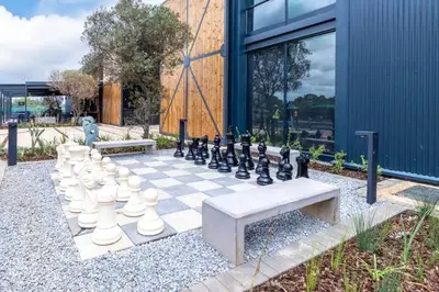 a chess board with a giant chess board at Greencreek Lifestyle in Pretoria