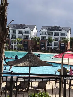 a group of people swimming in a swimming pool at The Blyde SUPER STAR in Pretoria