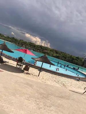 a group of people in the water at the beach at The Blyde SUPER STAR in Pretoria