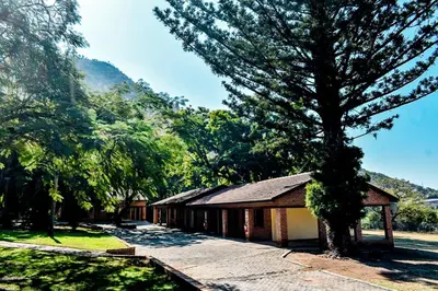 a building with a tree in front of it at Phabema Guest House in Steelpoort