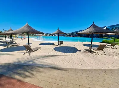 a group of chairs and umbrellas on a beach at Beach-Style Bliss at The Blyde in Pretoria