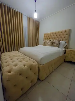 a bedroom with a large bed with a large ottoman at The Blyde 3bed Beach Facing F&S Luxurious 2 in Pretoria