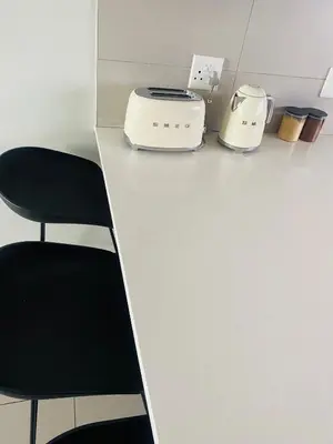 a counter with two toasters and a toaster at The Minimalist Hideout in Midrand