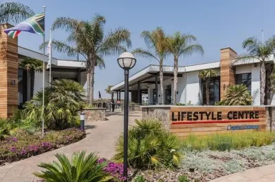 a street light in front of a life service center at Shezi Cozy Home at The Blyde in Pretoria