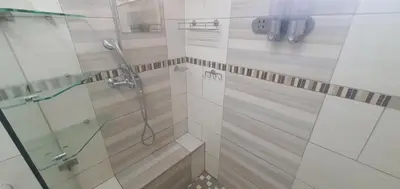 a bathroom with a shower with a glass door at 329 on 30th Avenue Villieria Drian in Pretoria