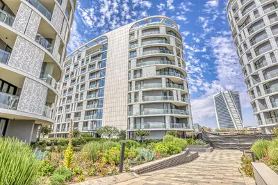an apartment building with two tall buildings at Stormside at Ellipse in Midrand