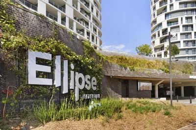 a building with a sign on the side of it at WanderHaus Haven, Ellipse in Midrand