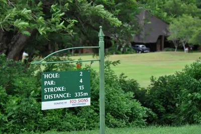 a sign in a field with a house price sign at Kruger Park Lodge Unit No. 509 in Hazyview