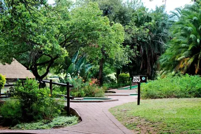 a sign that says walk out in a park at Kruger Park Lodge Unit No. 608B in Hazyview