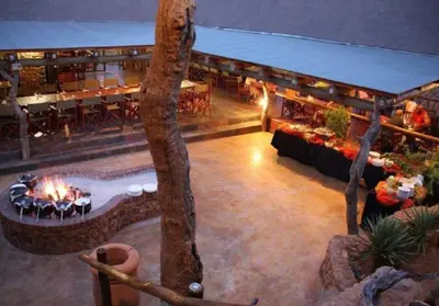 an aerial view of a restaurant with a fire pit at Ngong Hill, Mabalingwe in Bela-Bela