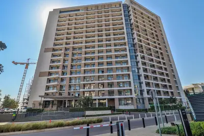 a tall building with a street in front of it at 301 Menlyn Maine Trilogy Apartment in Pretoria