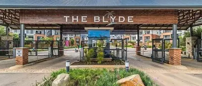 a bus stop with a sign that reads the bulgue at The Blyde 1317 in Pretoria