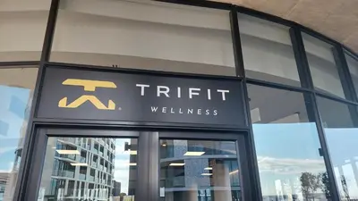 a sign on the front of a building at Modern 1 Bedroom Executive Apartment in Waterfall in Midrand