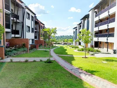 an empty street in an apartment building at Modern 2 bedroom at Waterfall Ridge-Midrand in Midrand